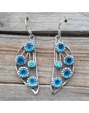 Boucles d ' oreilles Topaze .