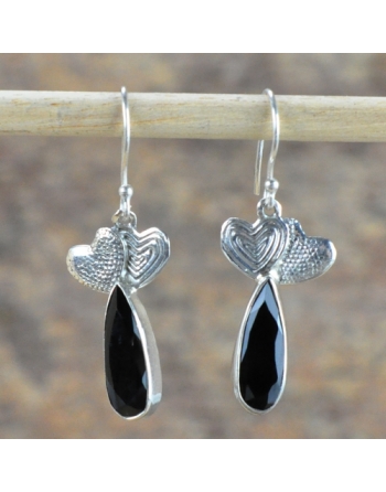 Boucles d ' oreilles Onyx .